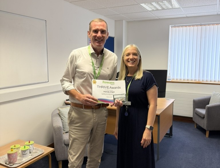 Image showing Charlotte O'neill receiving Thrive Award from Iain Cameron