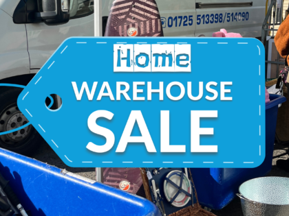 graphic tag saying home waerehouse sale with a van and items in the background